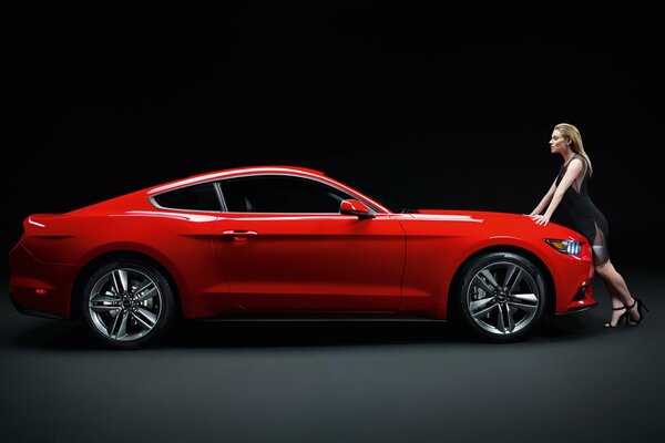 Chick red car photo shoot in dark colors