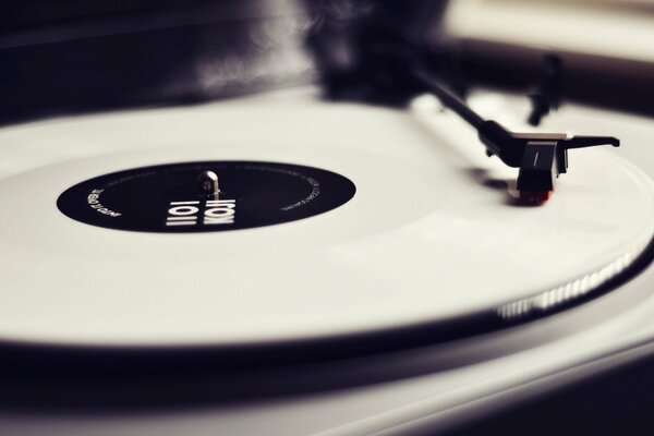 A musical vinyl record is being played