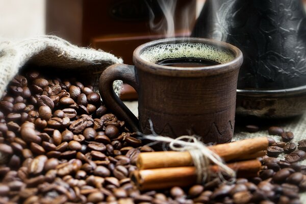 Hot coffee in a clay mug