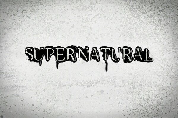 The inscription EA on a gray background Supernatural