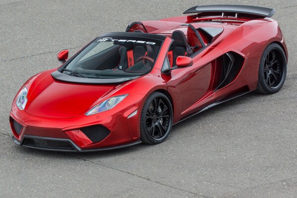 The red car. Tuned supercar