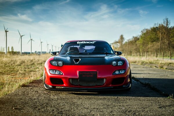 Mazda RX-7 on a country road front view