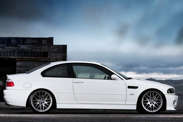 Clouds are gathering over the white car