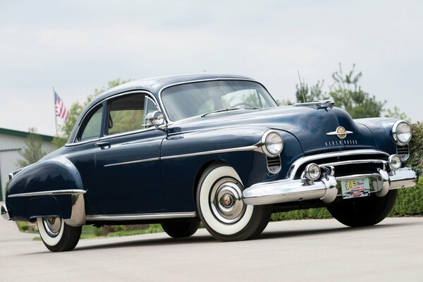 Blue Oldsmobile futuramic coupe 1950