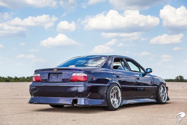 Toyota tuning against the sky and clouds