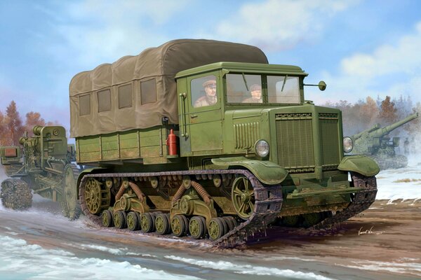 The Voroshilovets tractor is towing a heavy howitzer