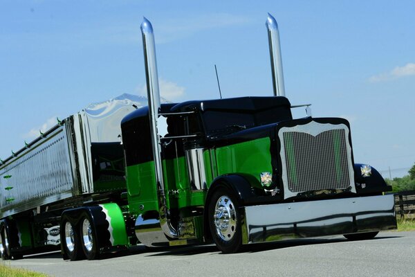 Chrome green truck on the road