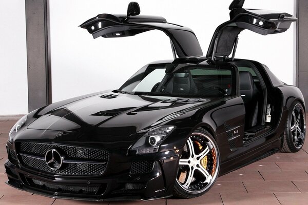 Black Mercedes car with folding doors