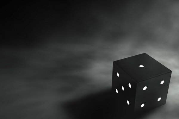 Le cube noir et blanc est tombé par unité