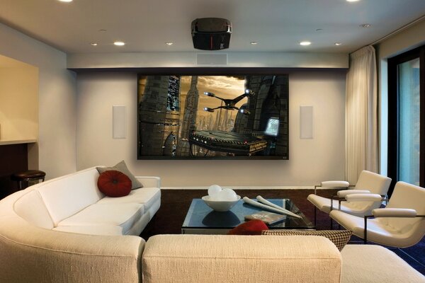 Stylish living room with cinemas and panoramic windows