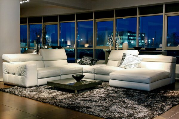 Living room with a large, white sofa