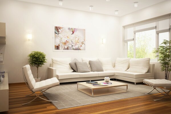 Белый диван в стильном интерьере жилой комнаты