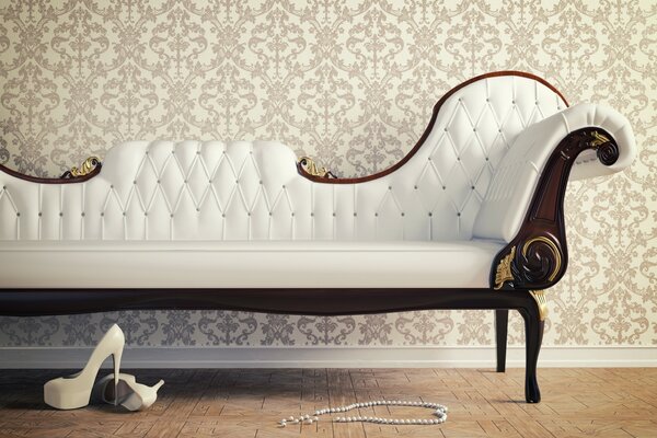 Шикарный белый диван на фоне обоев
