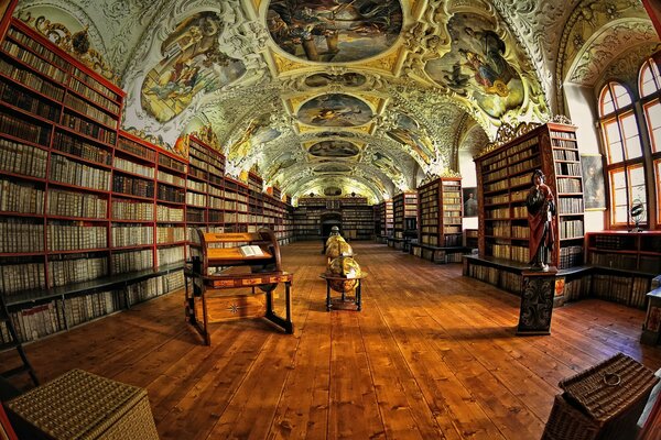 The interior of a large hall with a piano in Prague