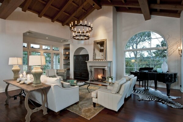 Design of a room with a grand piano and a fireplace