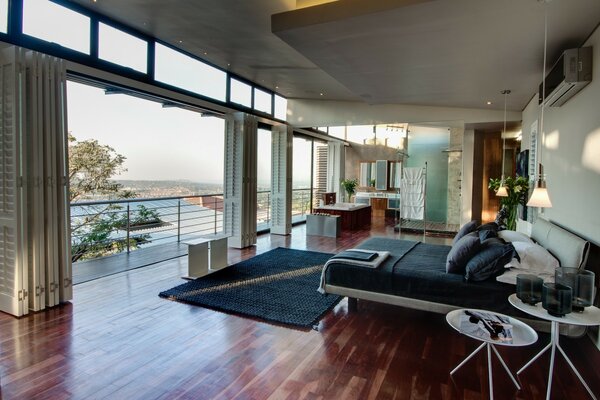 Stylish bedroom with an open balcony