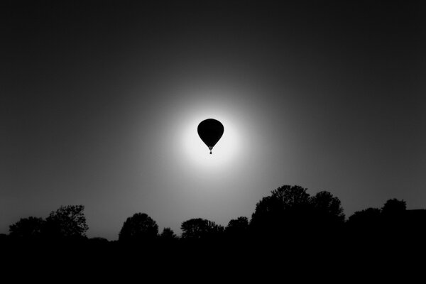 Silhouette of a balloon against the sky