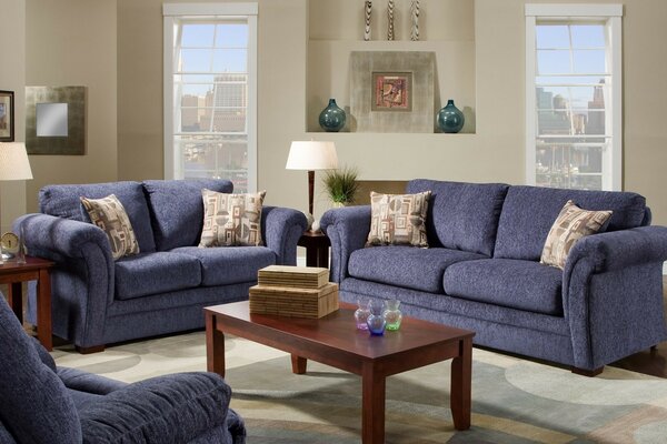 Living room design with purple furniture