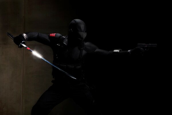 Ninja with a sparkling blade on a black background