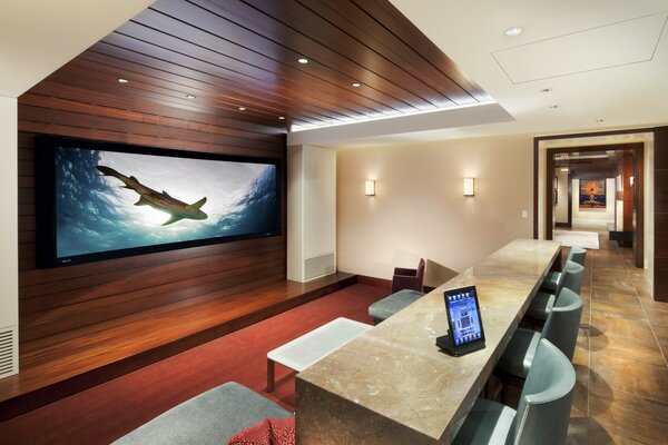 Huge TV in a modern house