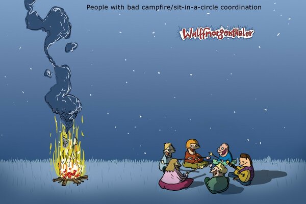 Picnic at night by a warm campfire