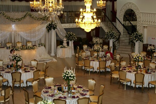 A large banquet hall decorated for the celebration