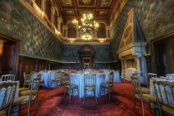 Restaurant hall with frescoes and vintage walls