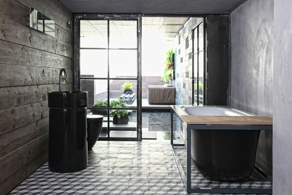 Bathroom design with black plumbing fixtures