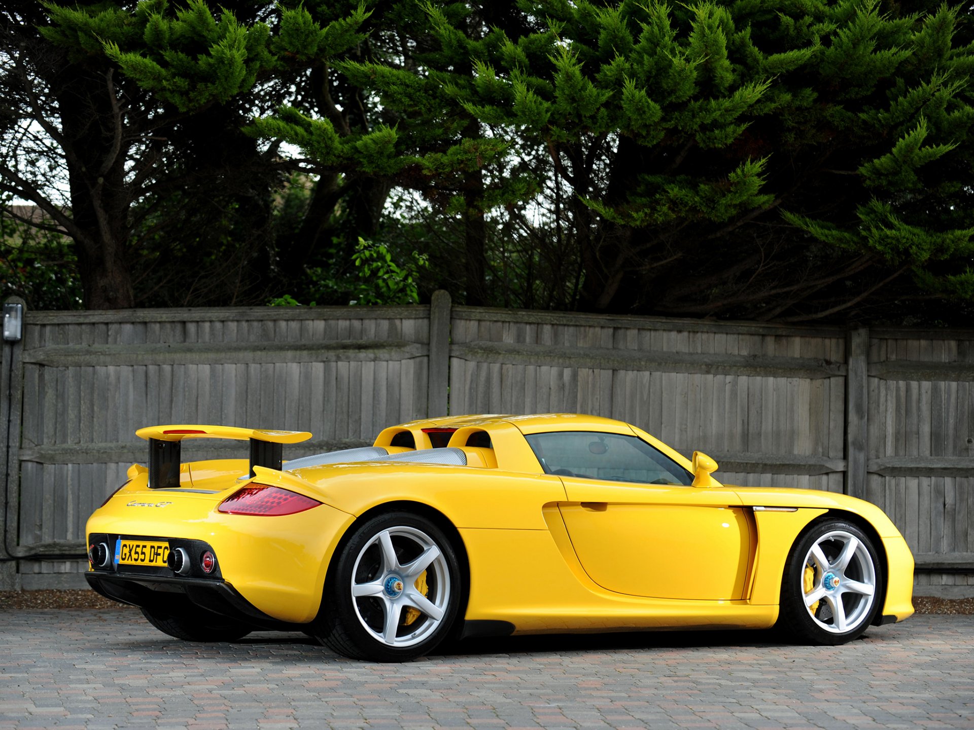 porsche carrera gt porsche carrera gt supercar yellow rear view