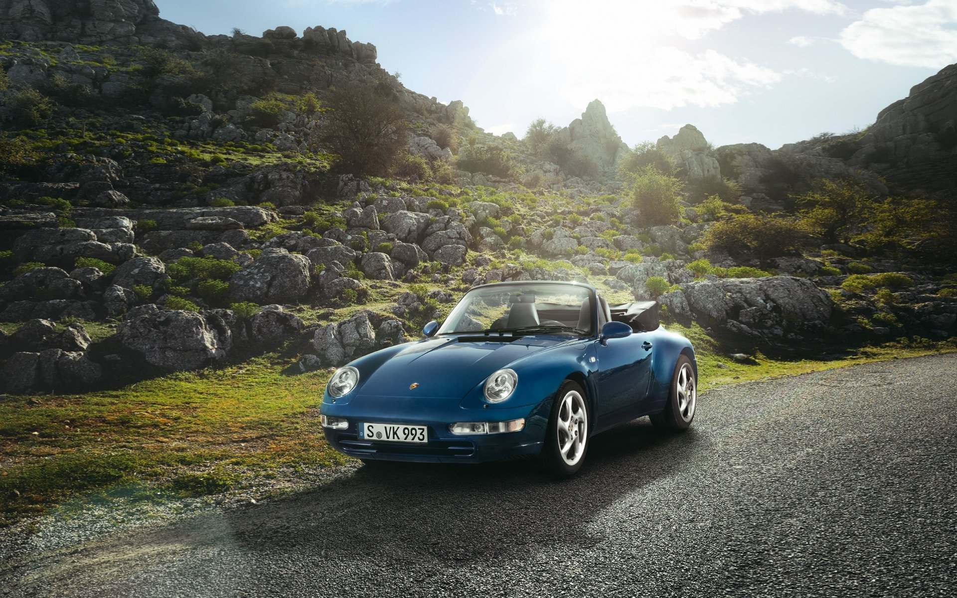 porsche 911 carrera 3.6 convertibile 1994 porsche carerra strada pietre cielo