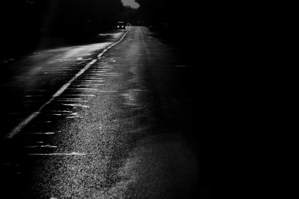 Black and white road in the dark