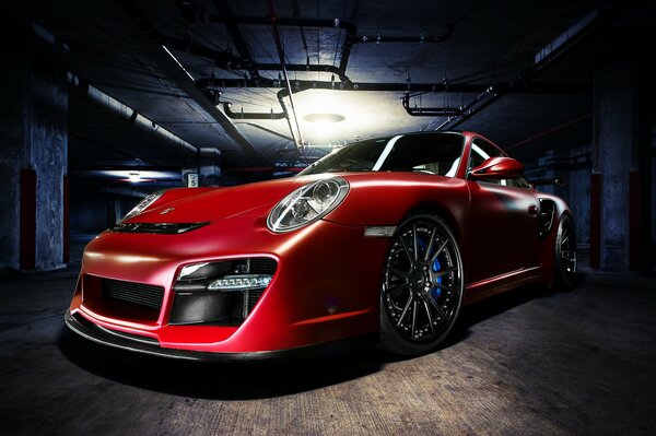 Brutal red porsche 911 in the garage