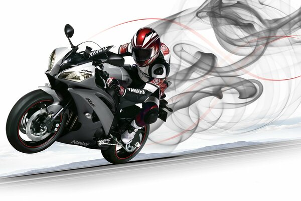 A sports motorcycle rushes already smoking