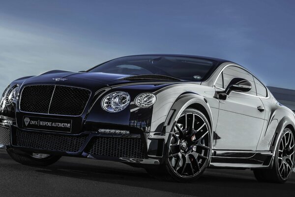 Wallpaper with black mirrored bentley