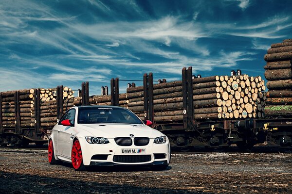 Bmw with red wheels blue sky