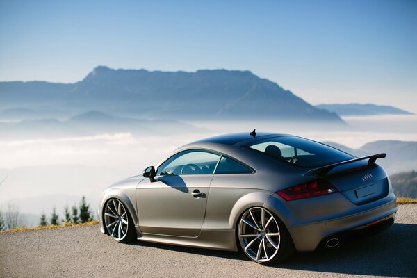 Against the background of distant mountains - a German Audi car