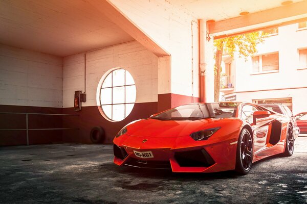 Legendary Red Lamborghini Aventador Supercar front and side view