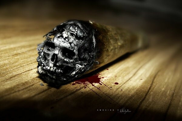 Cigarrillo . Muerte para el hombre. Ceniza