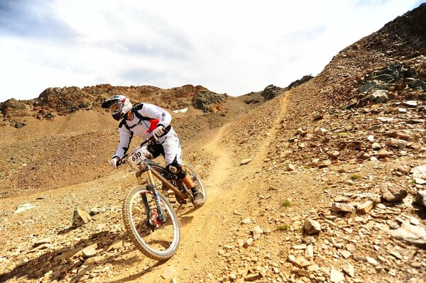 Risky descent on a mountain bike