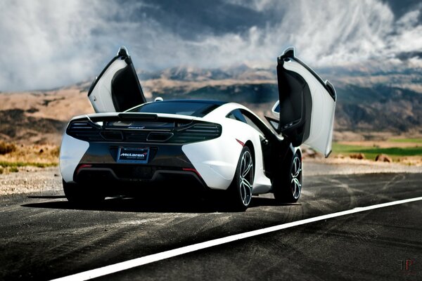 Sports car with doors opening to the top