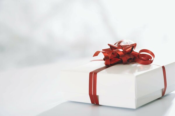 White box with red bow