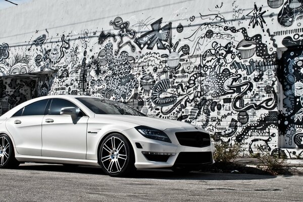 Mercedes-benz cls63 white on graffiti background