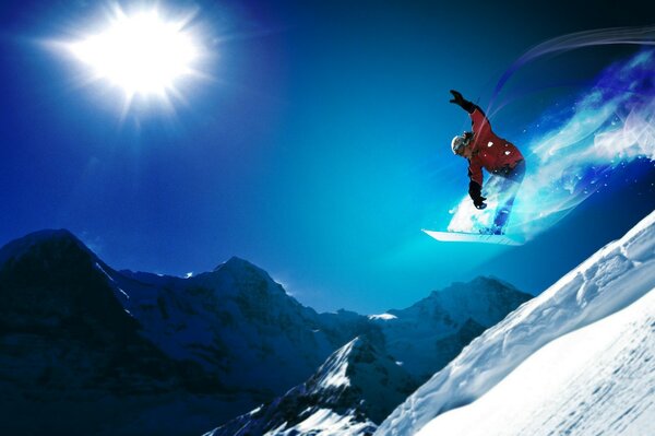 Snowboardzista w skoku na zboczu góry