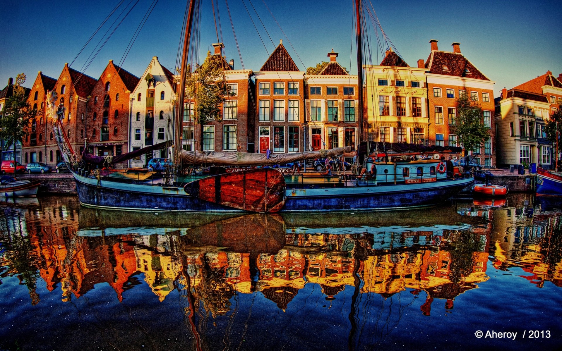 groningen river the netherlands sailboats embankment