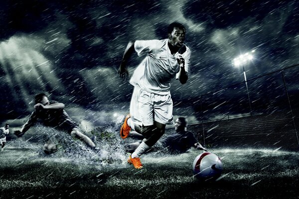 Football against the background of thunderstorms and rain