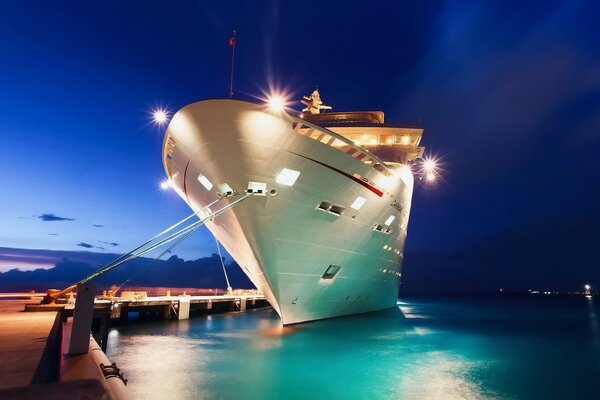 The ship is at the pier at dawn