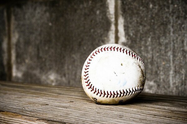 Baseball on the background of the wall