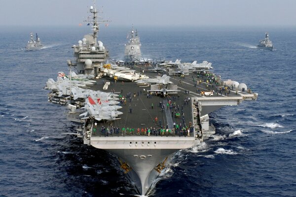 Aircraft carrier ship on the background of the ocean