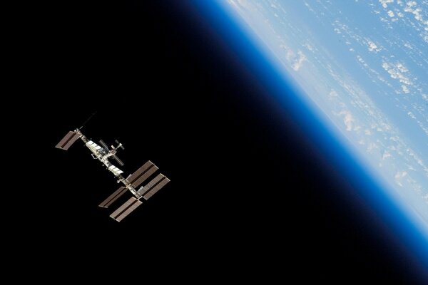 The ISS orbital station in space