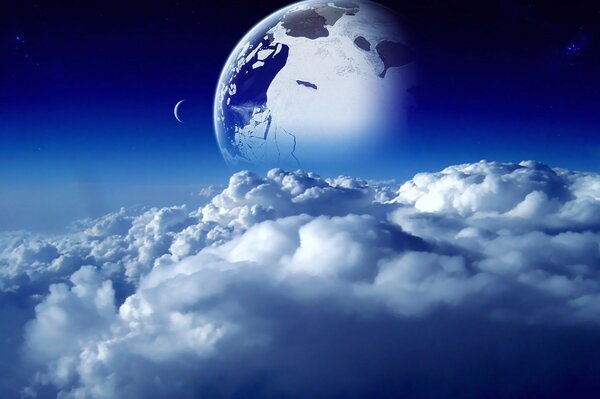 Imagen del planeta tierra en un fondo de nubes desde el espacio con un mes